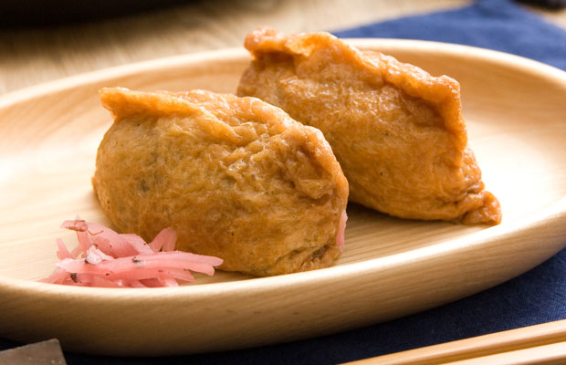 Inarizushi (rice wrapped in sweetened, fried tofu pocket)
