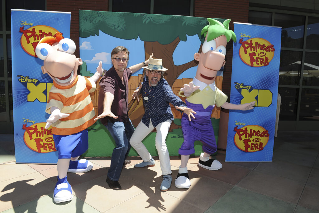 PHINEAS AND FERB - "Phineas and Ferb" creators and executive producers Dan Povenmire and Jeff "Swampy" Marsh at a screening event to promote the "Last Day of Summer" in Burbank California on Monday, June 8. "Phineas and Ferb: Last Day of Summer," premieres Friday, June 12 at 9:00 p.m. ET/PT as a simulcast on Disney XD and Disney Channel. (Disney XD/Valerie Macon) PHINEAS, DAN POVENMIRE (CO-CREATOR/EXECUTIVE PRODUCER, "PHINEAS AND FERB"), JEFF "SWAMPY" MARSH (CO-CREATOR/EXECUTIVE PRODUCER, "PHINEAS AND FERB"), FERB